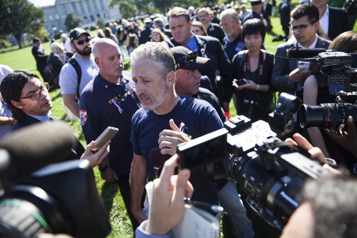 Former "Daily Show" host Jon Stewart answers questions after speaking at a rally for 9/11 first responders in front of the U.S. Capitol in Washington, D.C., on Sept. 16, 2015.