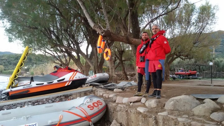 Enrique Álvarez poses on shore with another volunteer from Proactiva Open Arms in Lesbos, Greece.