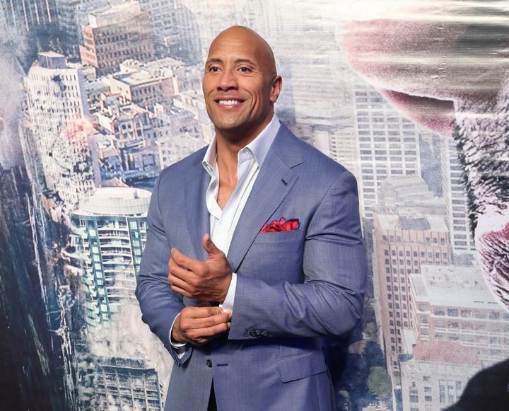 Will The Rock Ever Finish Buttoning His Sleeve?