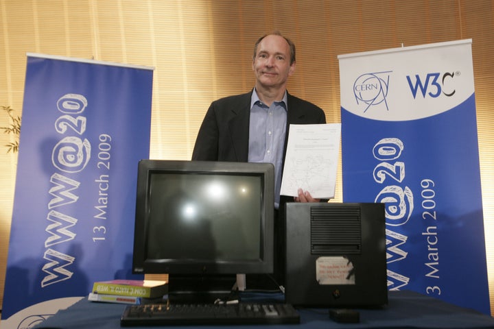 Tim Berners-Lee, inventor of the Web, poses in front of the first World Wide Web server on March 13, 2009. 