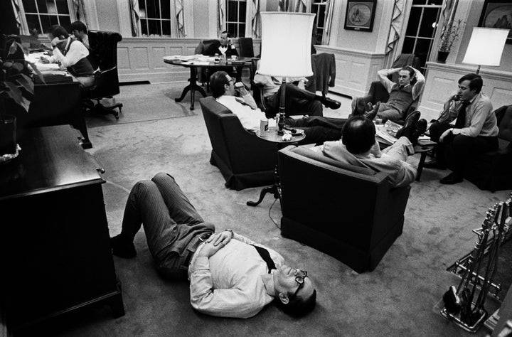 Greenspan lying on the floor of then-White House chief of staff Dick Cheney's office in Washington on Feb. 24, 1976, awaiting the results of the New Hampshire primary in which President Gerald Ford was competing. Greenspan was an aide to Ford, who won the primary.