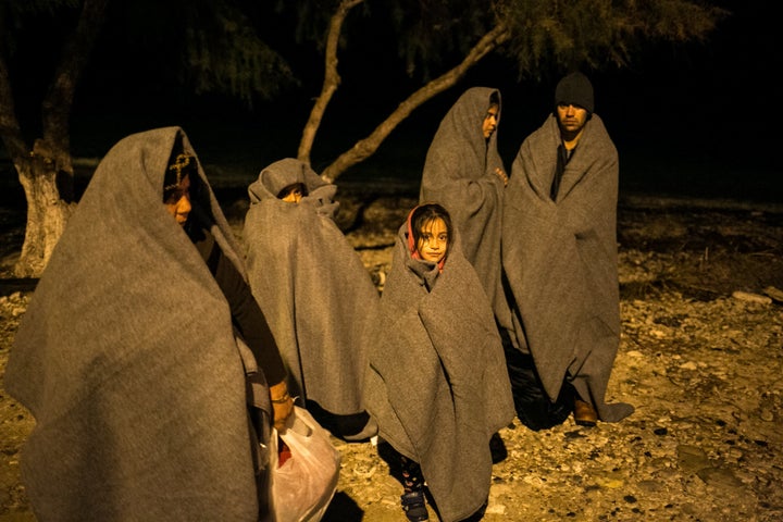 When Moria gets crowded, families sleep outside on the ground.