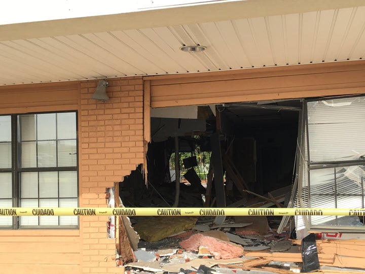 The 40-year-old, who was taken for a mental evaluation, managed to break through the business' back wall.