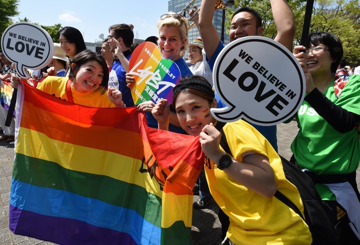 Tokyo Rainbow Pride participants pose for photographers before the parade on April 26, 2015.