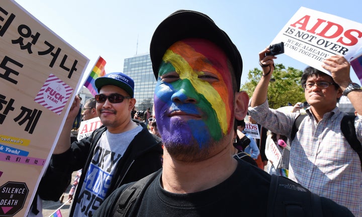 Participants march during the Tokyo Rainbow Pride 2015 parade on April 26, 2015.