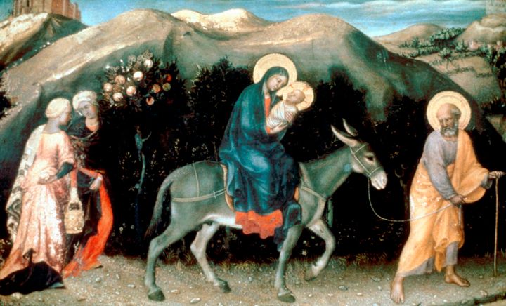 'Adoration of the Magi'. Mary, riding on a donkey led by Joseph, carries Jesus, wrapped in swaddling bands. All three have haloes. From the Uffizi Gallery, Florence.