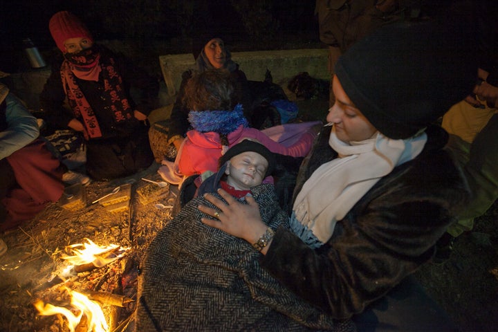 Sarandon meets a tentless family in Moria Camp, a temporary settlement for migrants and refugees.