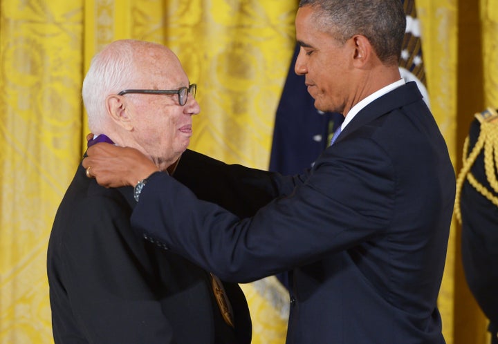 President Barack Obama presents the 2012 National Medal of Arts to Kelly at the White House in July 2013