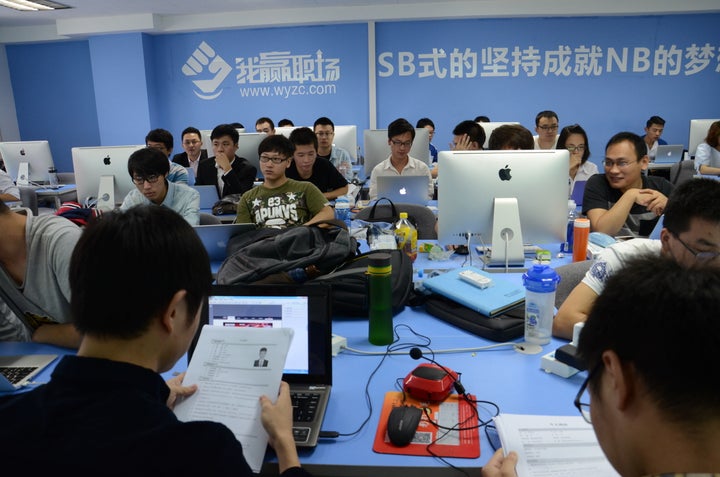 Students take part in a coding class at Uplooking's Beijing headquarters.