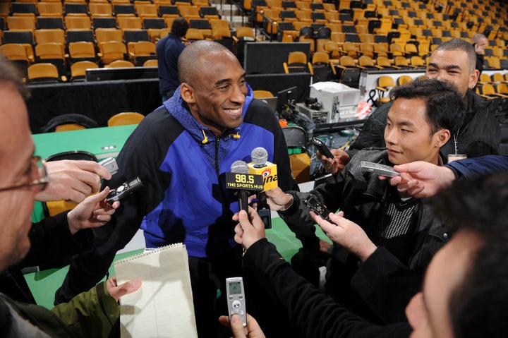 Bryant gets interviewed prior to a game against the Boston Celtics on Feb. 10, 2011, in Boston, Massachusetts.