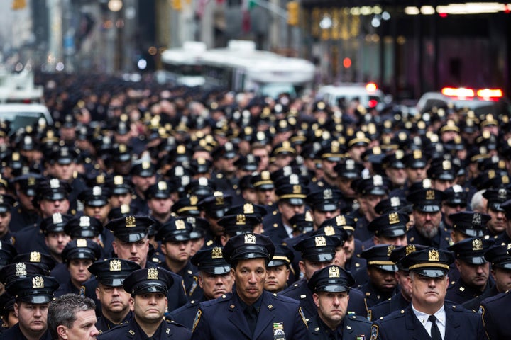 Law enforcement officials attend the funeral of Joseph Lemm.