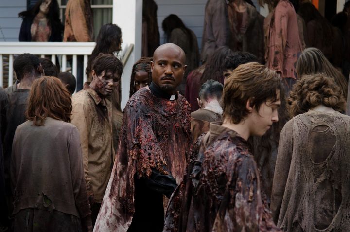 Father Gabriel (Seth Gilliam) surveys the scene in a Season 6 episode of “The Walking Dead."