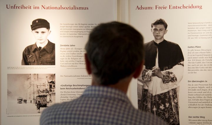 Benedict XVI's childhood home in Marktl was turned into a museum featuring images from his early years in the Hitler Youth (left) and the seminary. It attracts thousands of visitors annually.