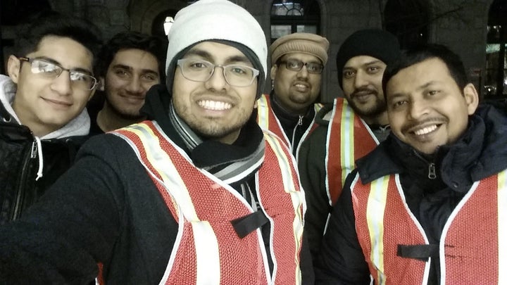 A group from the Ahmadiyya Muslim Youth Association USA in Times Square in the early morning of New Year's Day in 2015 to clean up trash. Members plan do it again after midnight on January 1, 2016.