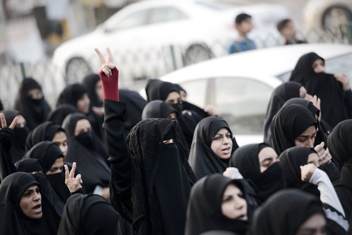 Bahraini women take part in a protest in the village of Jidhafs, west of Manama, against the execution of prominent Shiite Mu