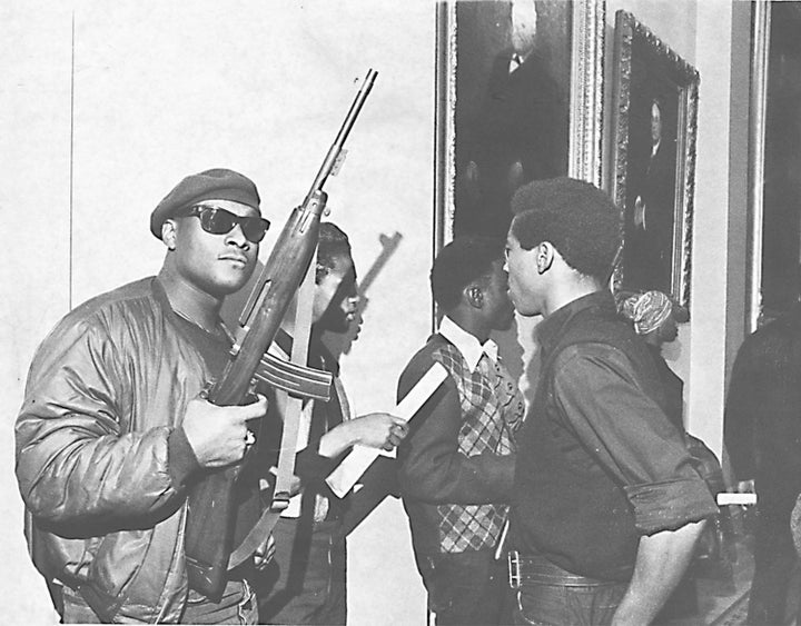 Members of the Black Panthers hold guns during the group's protest at the California Assembly in May 1967.