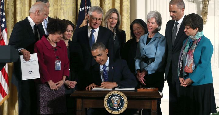 President Barack Obama signs a memorandum establishing the White House Task Force to Protect Students from Sexual Assault in January 2014. The Obama administration has ramped up the number of high schools and colleges under Title IX investigations. 