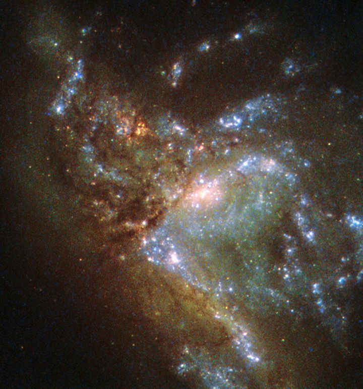 The image may look chaotic, but scientists say that the new galaxy will eventually settle down into its new shape