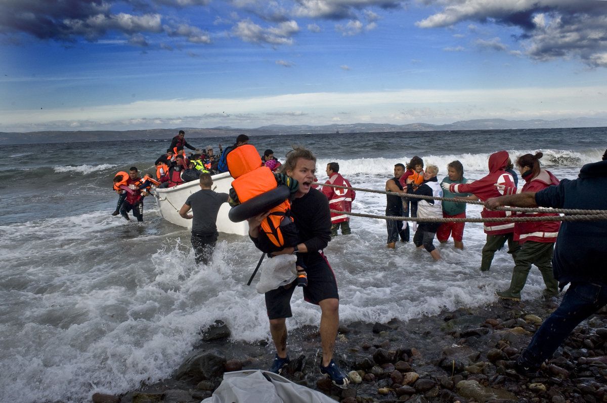 Refugee boats reach Lesbos.