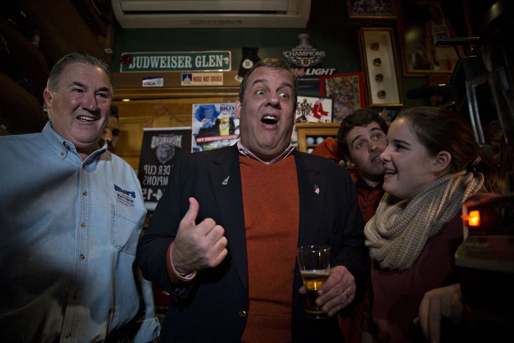 New Jersey Gov. Chris Christie (R) enjoying a moment at Billy's Sports Bar in Manchester, New Hampshire, while campaigning for the Republican presidential nomination. The GOP presidential contender has spent a great deal of time in the state.
