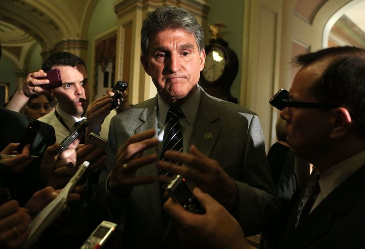 Sen. Joe Manchin (D-W.Va.) talks to reporters in April 2013, moments after the Senate rejected his bill to tighten background checks on gun sales. It needed 60 votes to pass, but it failed, 55-45.