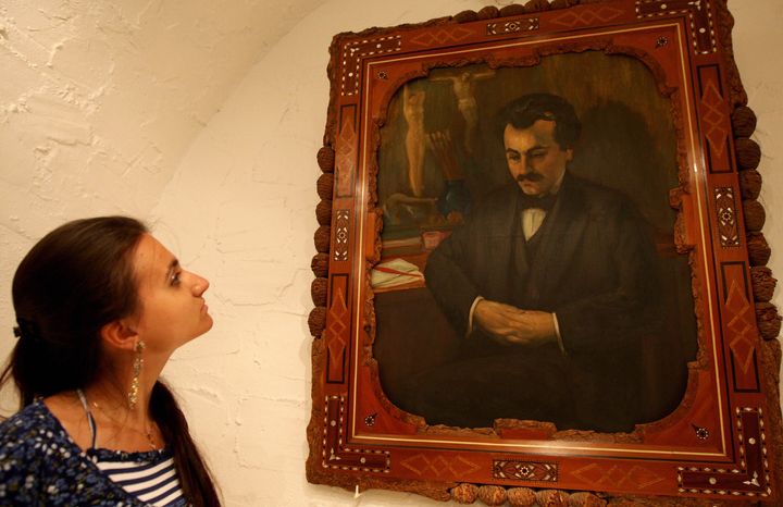 A self-portrait of Lebanese-American poet Kahlil Gibran hangs in his home, now a museum, in the village of Besharre, Lebanon. He died in New York in 1931, not many years after the publication of his best-known work, The Prophet.