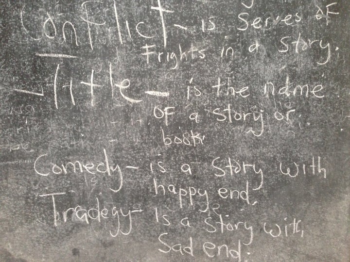 A blackboard displays a storytelling lesson at the M.V. Massaquoi School, a former Ebola holding center, in West Point, Liberia.