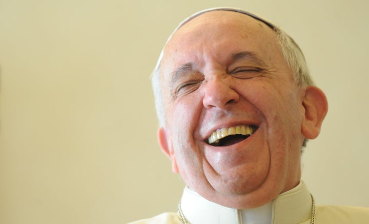 Pope Francis laughs during a private audience with the Prime Minister of Saint Vincent and the Grenadines at the Vatican.