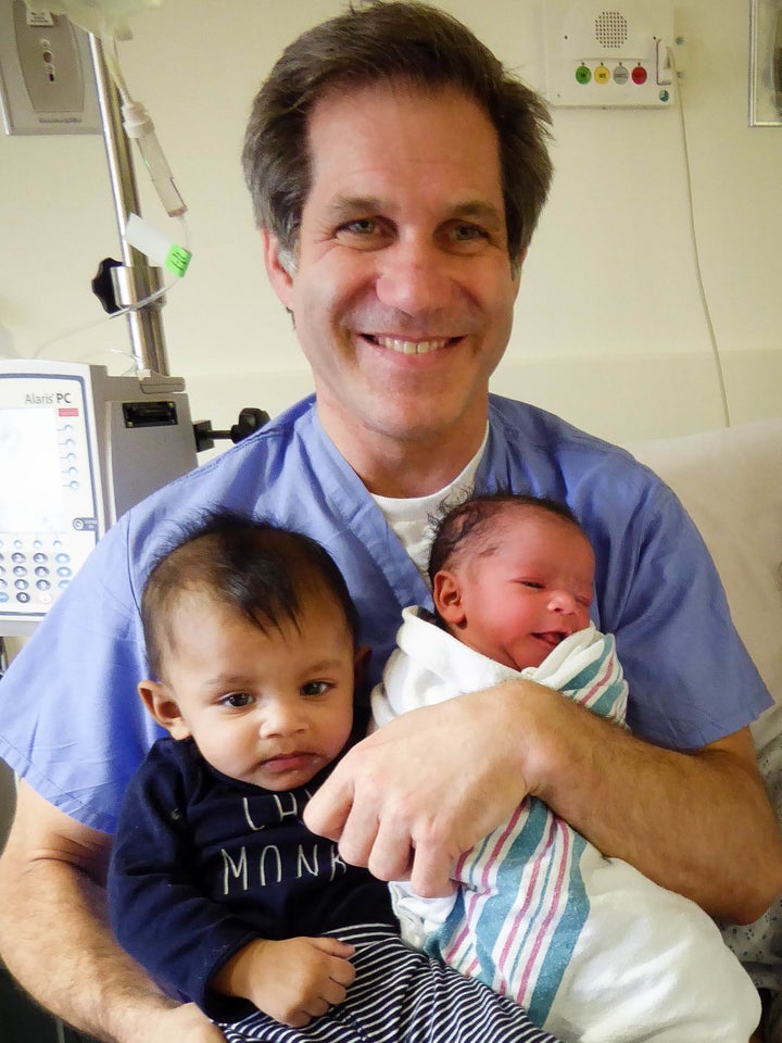 Dr. Gearhart with Gupta and Patel's two daughters.