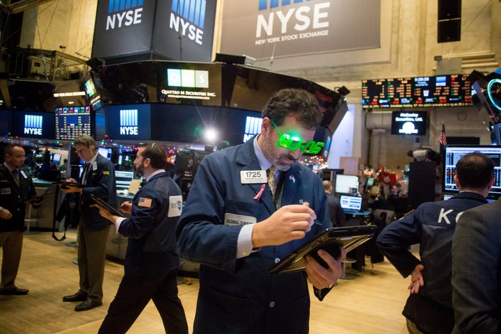 Traders on the floor of the New York Stock Exchange.