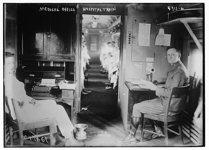 Medical office in a hospital train, circa 1900.