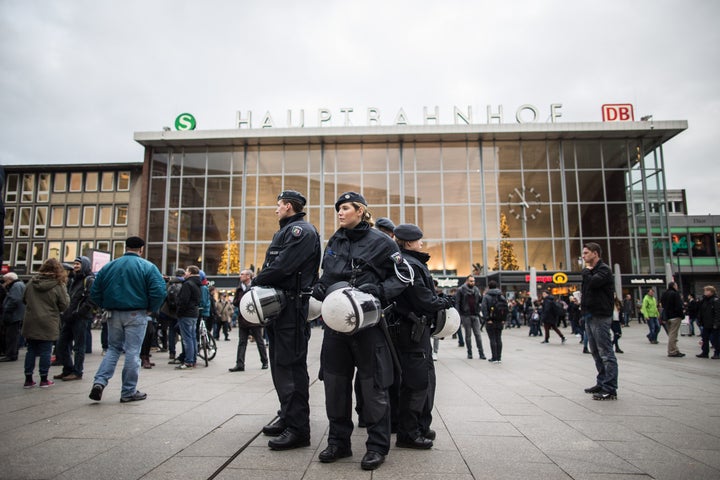 Police officers survey the area in front of the train station in Cologne, in western Germany. No arrests have been made thus far for the large-scale assaults that took place there on New Year's Eve.