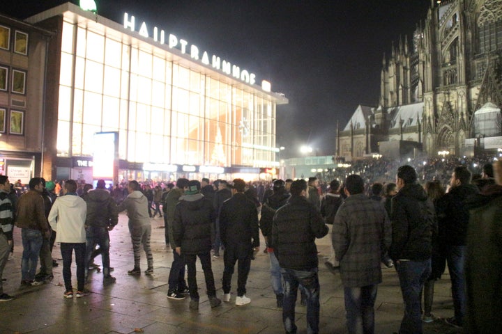 People gathering in front of the station on New Year's Eve.