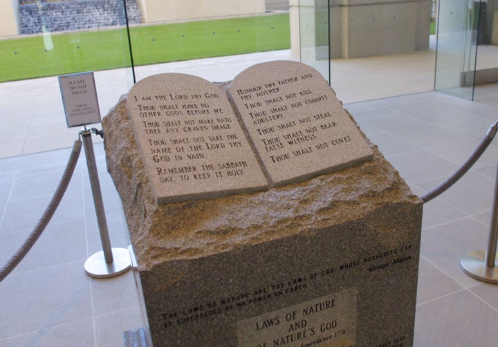 Moore was kicked off the Alabama Supreme Court in 2003 for refusing to remove this Ten Commandments monument that he'd sneaked into the building.