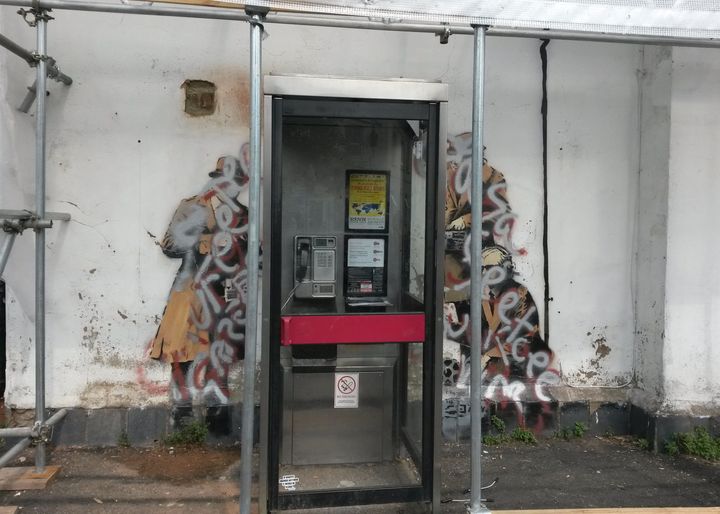 Banksy is believed to have pained "Spy Booth" onto the house in Cheltenham in 2014.