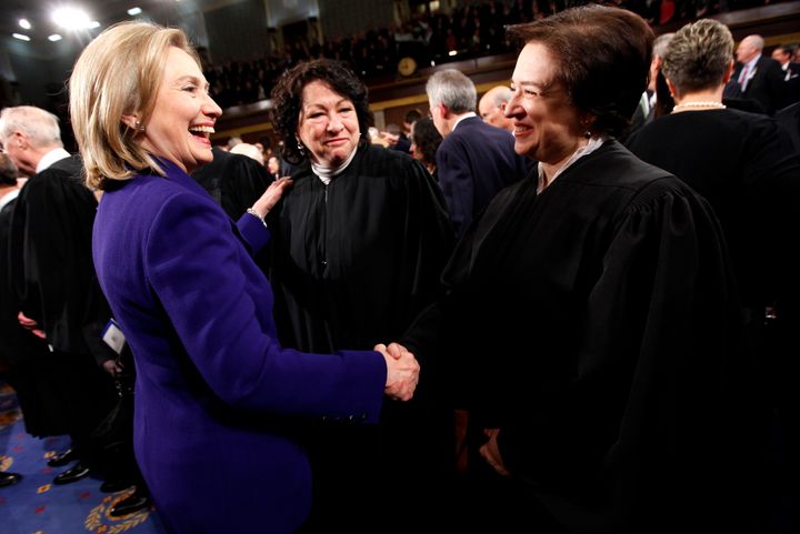 Secretary of State Hillary Clinton greets Sonia Sotomayor and Elena Kagan, two Supreme Court justices appointed by President Barack Obama, Jan. 25, 2011.