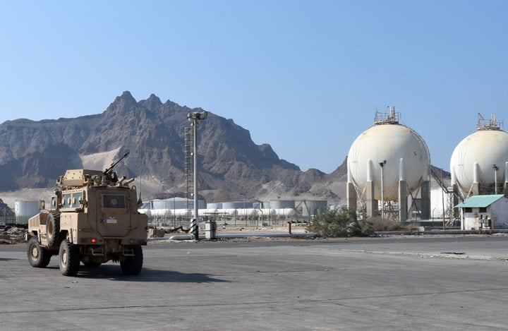 An Emirati army forces vehicle of the Saudi-led coalition, supporting forces loyal to Yemen's Saudi-backed President Abedrabbo Mansour Hadi, is seen at the an oil refinery in Yemen's port city of Aden on November 1, 2015. SALEH AL-OBEIDI/AFP/Getty Images