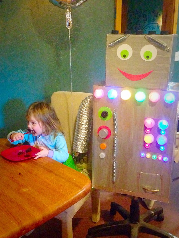 Melody eating cake with "Robot". 