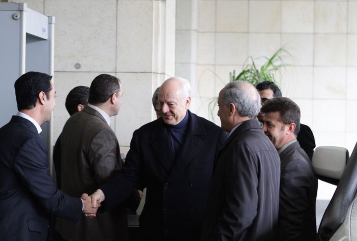 UN envoy for Syria, Staffan de Mistura (C), arrives at his hotel with Syrian assistant foreign minister, Ayman Sosan (2nd from R), on January 8 , 2016 in Damascus.