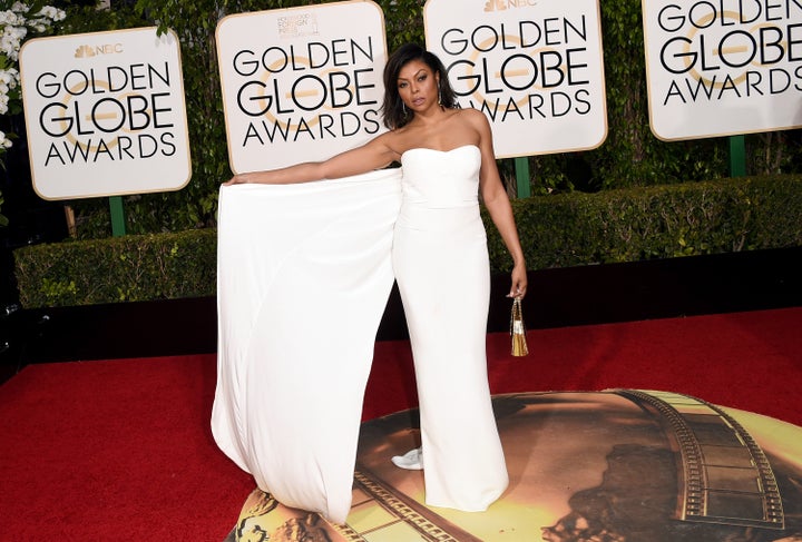 Taraji P. Henson shows off the dramatic train on her Stella McCartney dress at the 73rd Annual Golden Globe Awards in Beverly Hills, California.