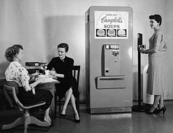 Three Women Enjoy Soup From A Campbells Vending Machine In Their Office 1950s Three Women Enjoy Soup From A Campbells Vending Machine In Their Office 1950s