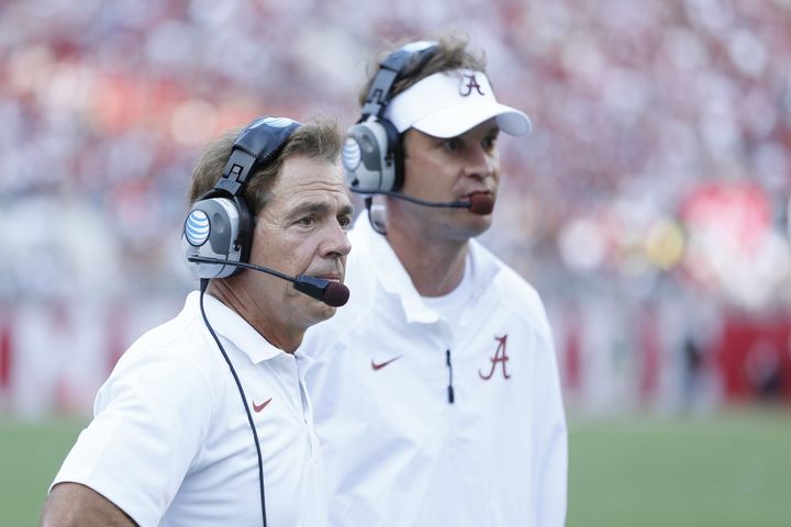 Hiring the controversial Lane Kiffin (right) as his offensive coordinator was one of Saban's best moves.