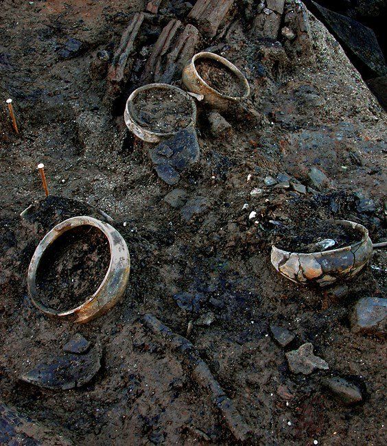 Clay pots containing the remains of a meal served some 3,000 years ago. 