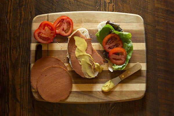 A meatless bologna deli sandwich, "made without the mystery."