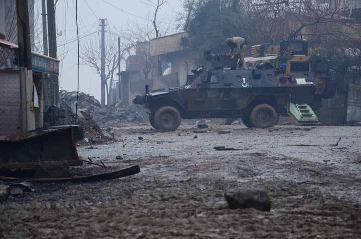 Turkish soldiers patrol the town of Cizre. Major fighting between the state and PKK militants has resulted in hundreds of deaths.