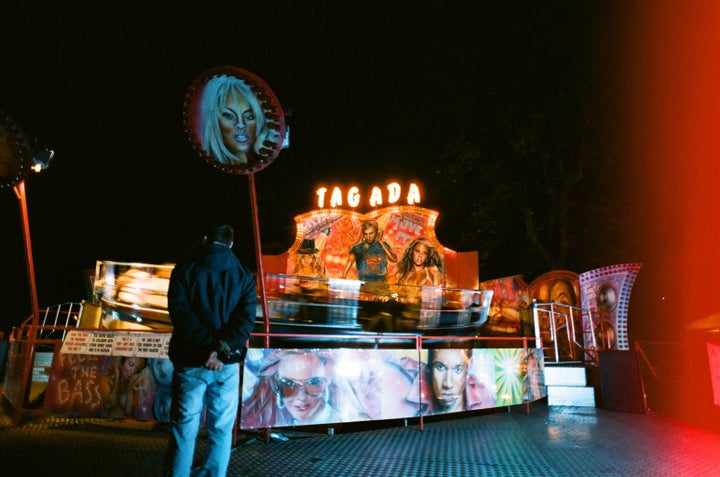 The spinning ride, identified as the Tagada, only gives riders a bar to hold onto as they're thrown around.