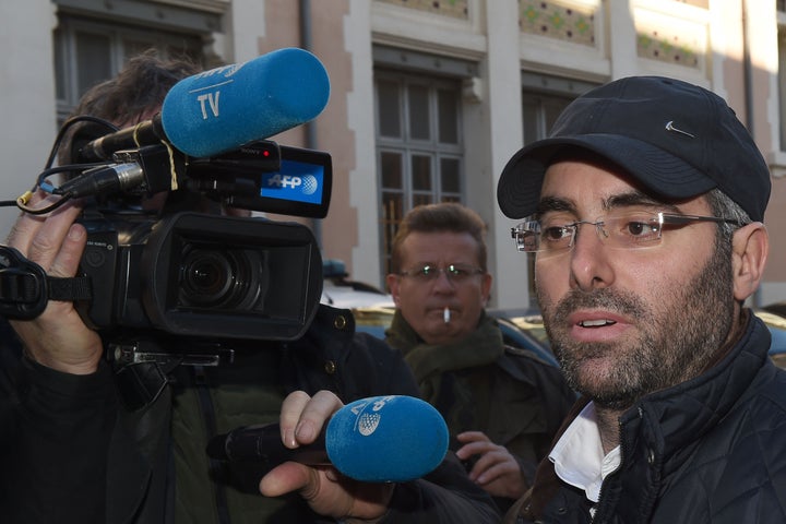 Benjamin Amsellem, who survived an attack by a teen with a machete, leaves police headquarters in Marseille, France, on Jan. 12, 2016.