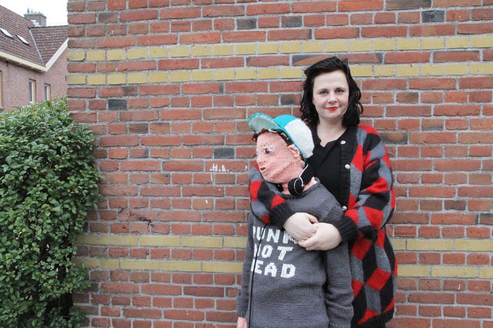 Marieke Voorsluijs, hugs her yarn son.