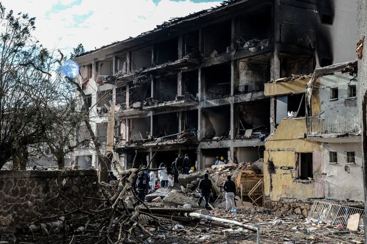 Six people died and dozens were wounded in a bomb attack blamed on Kurdish rebels that ripped through a police station and an adjacent housing complex.