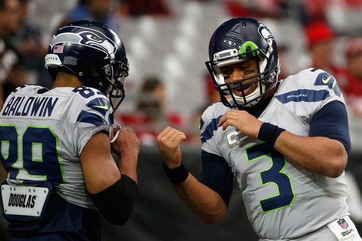 Russell Wilson (right) has tossed 15 touchdown passes to Doug Baldwin this season. Baldwin's 15 TDs are the most by any receiver in the NFL. He caught one against the Vikings last week.